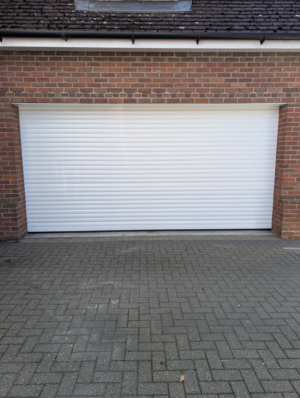 After: completed Rollrite roller garage door installation at an Essex home